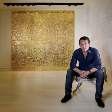 López, on a Claude Lalanne Crocodile stool in front of a Stingel painting at his Museo Jumex, which has helped raise Mexico City’s profile as a contemporary art destination since its opening in 2013.