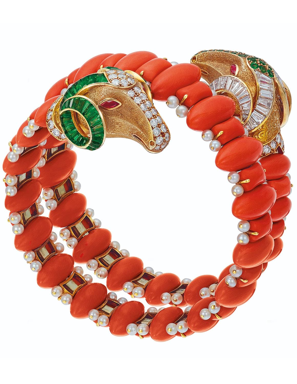 Red coral and gold snake bracelet with pearls and emerald details, featuring intricate gemstone embellishments.