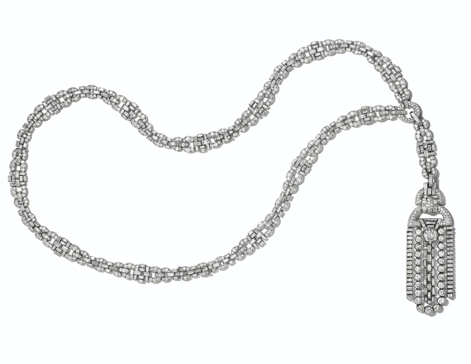 Elegant Art Deco diamond necklace with intricate geometric design and tassel detail.