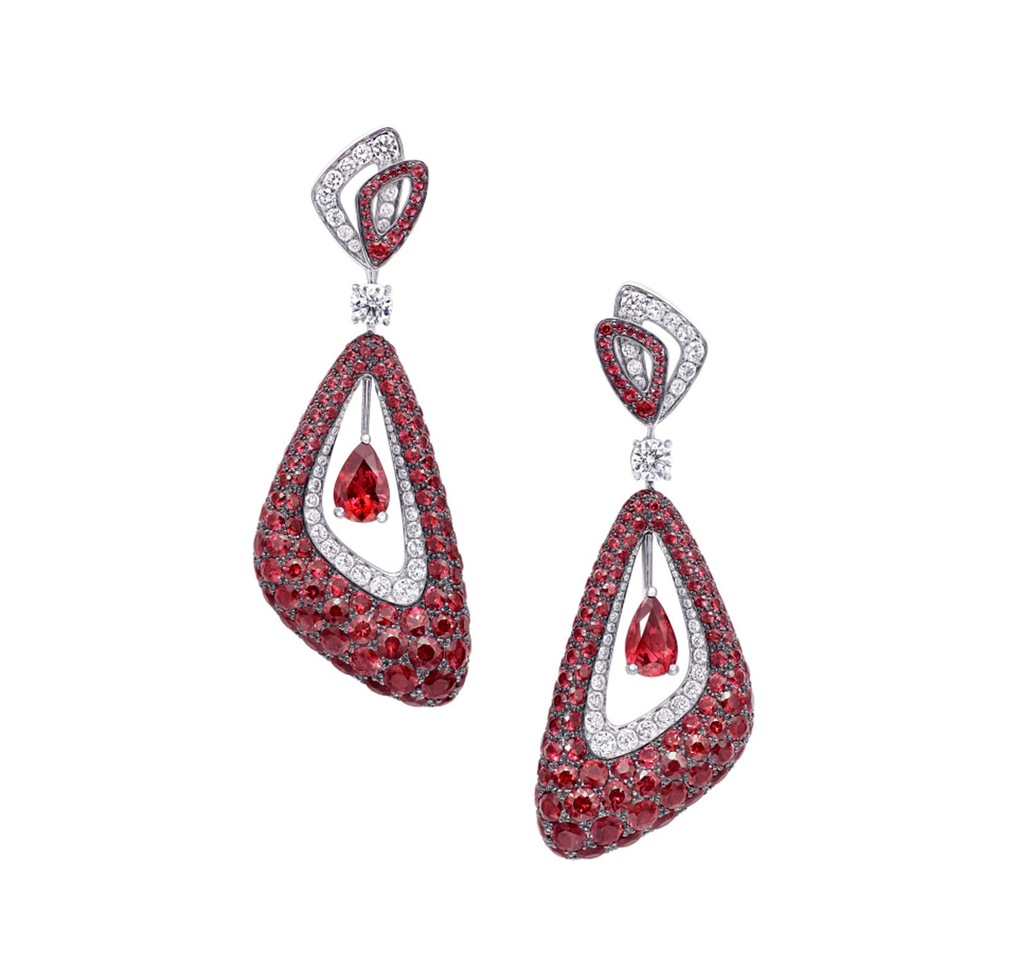Elegant red gemstone and diamond dangle earrings with intricate cut-out design against a plain white background.