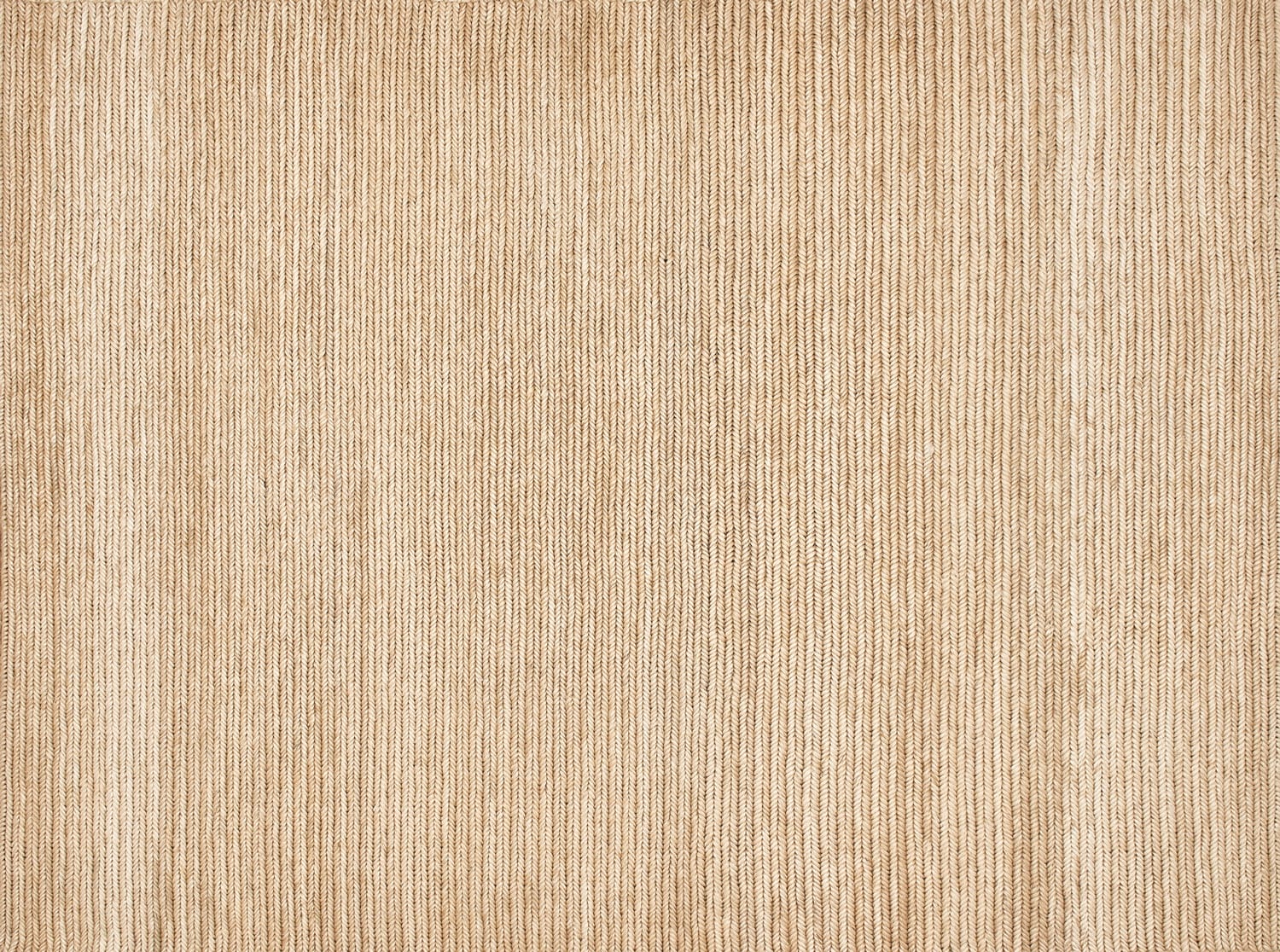 Beige knitted fabric texture with vertical ribbed pattern, suitable for backgrounds and textile design.