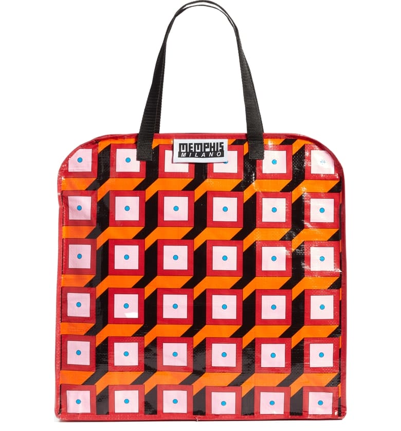 Colorful tote bag with geometric orange and red cube pattern and black handles.