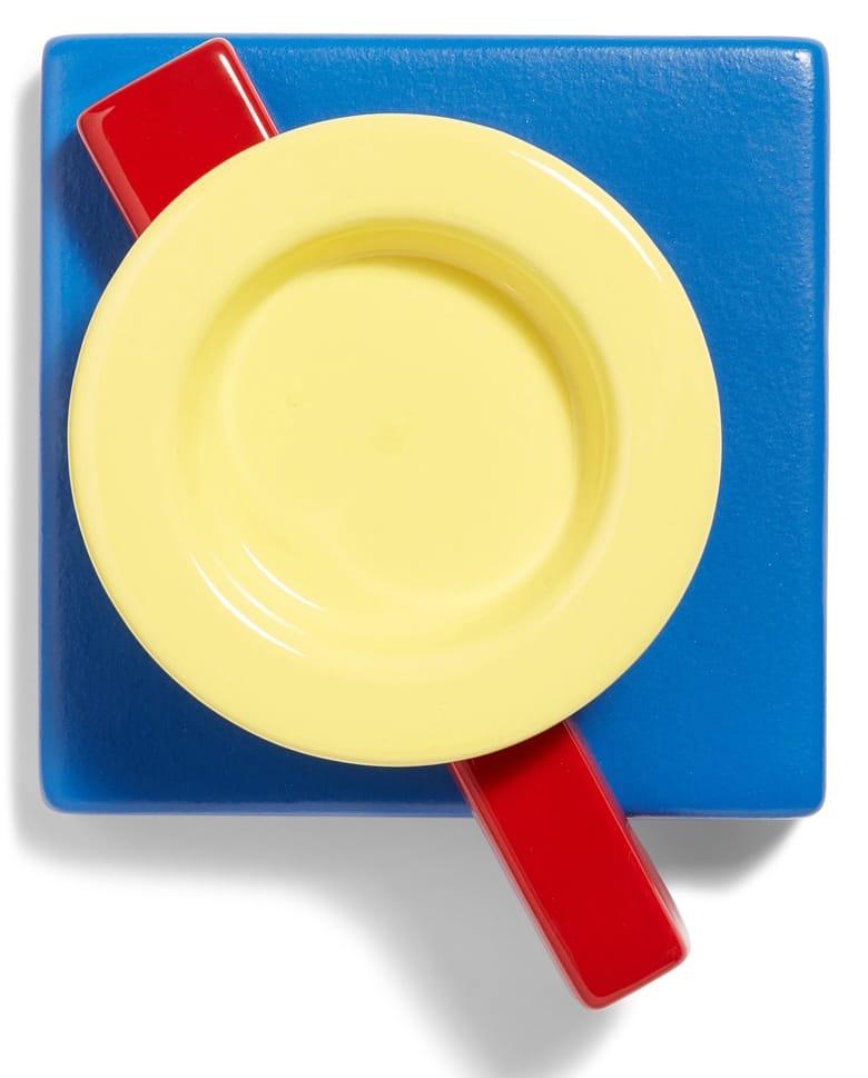Abstract composition with a yellow plate on a blue square, intersected by two red rectangles on a white background.