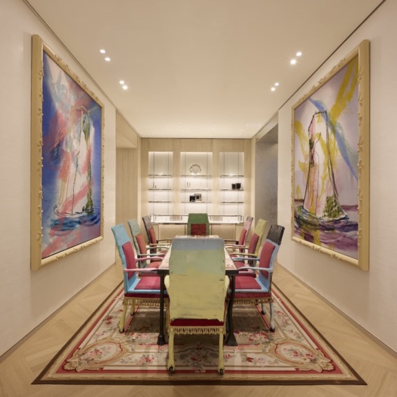 A pair of Julian Schnabel paintings face his own dining table and chairs in the homewares section.