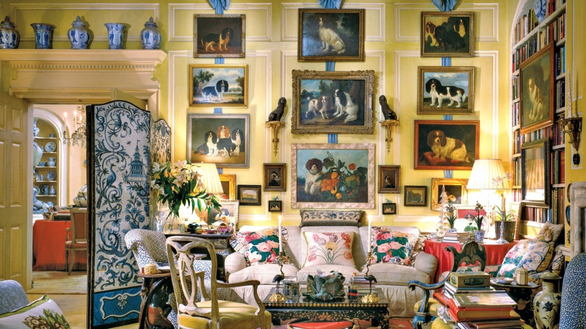 Elegant living room with classic decor, floral patterns, numerous dog paintings, and a variety of decorative vases on display.