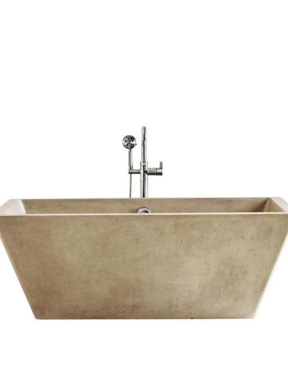 Rectangular freestanding stone bathtub with modern stainless steel faucet against white background.