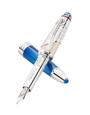 Luxury fountain pen with a blue and silver design, resting with its cap on the side.