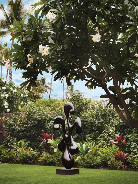 The homeowners commissioned the John Koga bronze sculpture that stands in the courtyard.