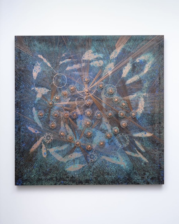 Abstract artwork with blue, brown, and white tones, featuring circular and linear patterns creating a dynamic, intricate design.
