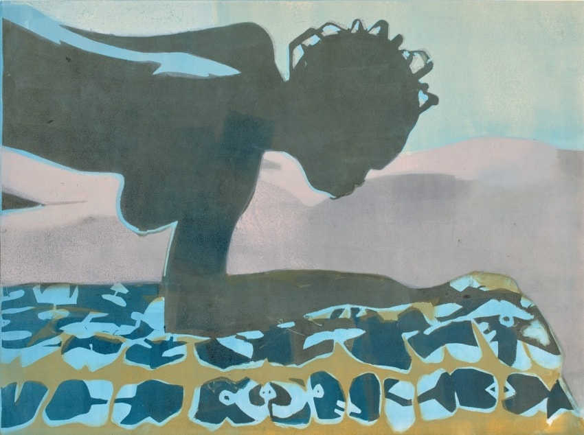 Silhouette of a person leaning forward over a blue and yellow patterned surface with a serene background.