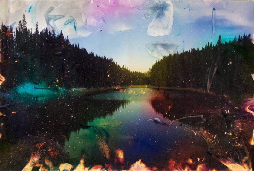 Surreal landscape of a forested lake with colorful abstract overlays and a vibrant sky.