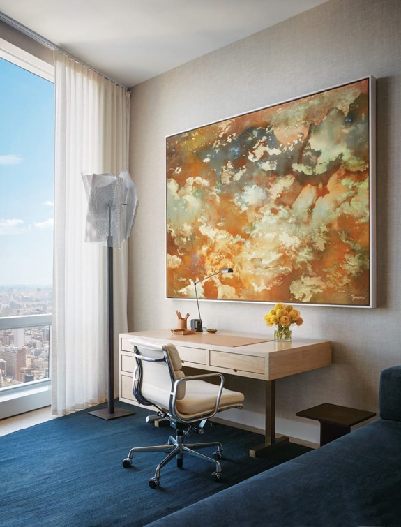 A billowy Jay Heikes artwork animates the office, which is outfitted with curtains made from a Rogers & Goffigon fabric and a Sacco rug in this penthouse by Shawn Henderson.