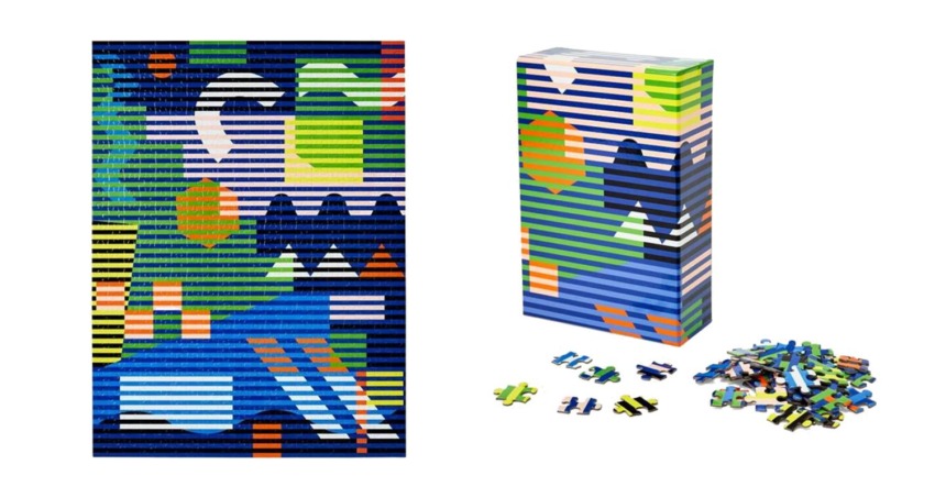 Colorful abstract puzzle box and completed puzzle with various scattered pieces in blue, green, orange, and white tones.