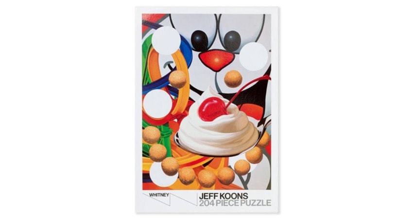 Colorful abstract puzzle art featuring a sundae with a cherry, circles, and geometric shapes.