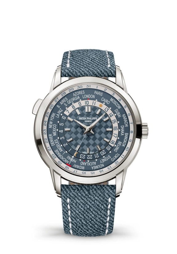 Luxury wristwatch with blue strap and detailed world time dial, displaying city names and time indicators.