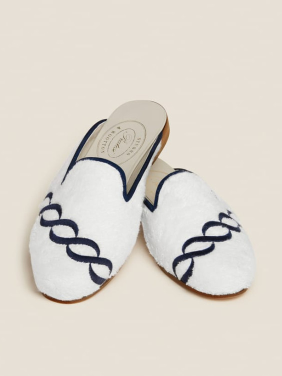Treccia mules by Pratesi for Stubbs & Wootton is recommended for a guest room.