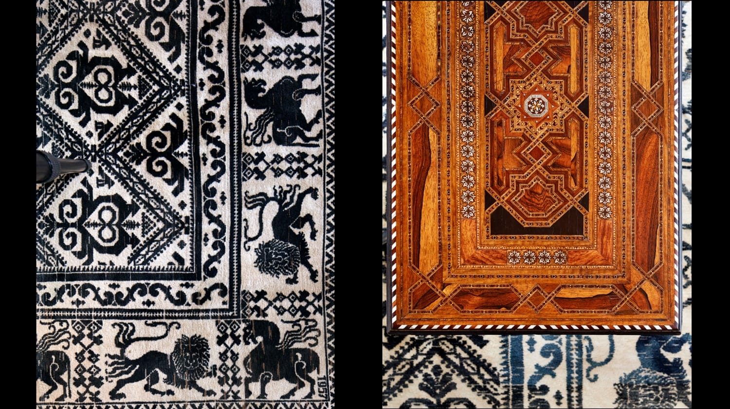 Ornate black and white carpet pattern on the left, intricate brown geometric table design on the right.