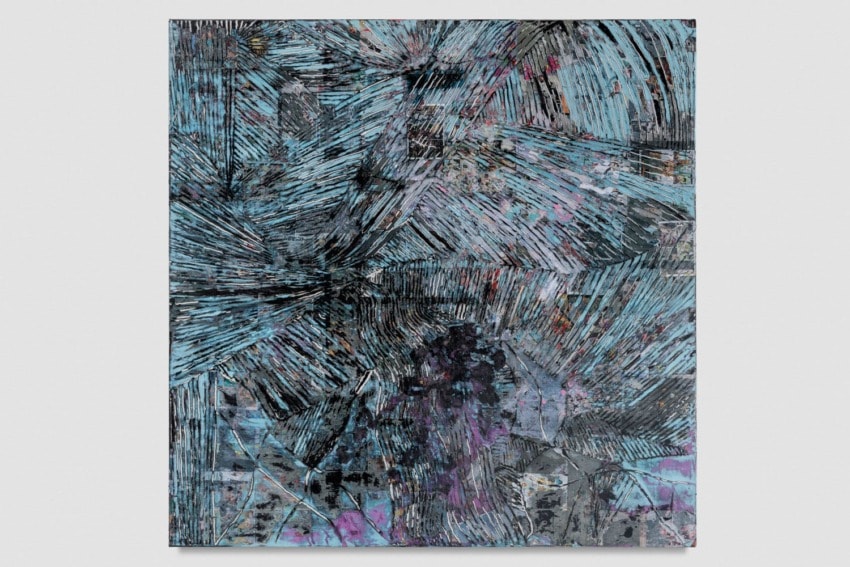 Abstract painting with blue and purple brushstrokes creating a dynamic, textured pattern on a canvas.