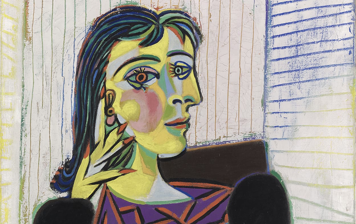 Cubist portrait of a woman with abstract facial features and colorful geometric shapes, by Pablo Picasso.