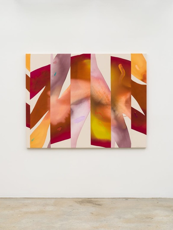 Abstract painting with overlapping red, orange, and yellow geometric shapes on a light background displayed on a wall.
