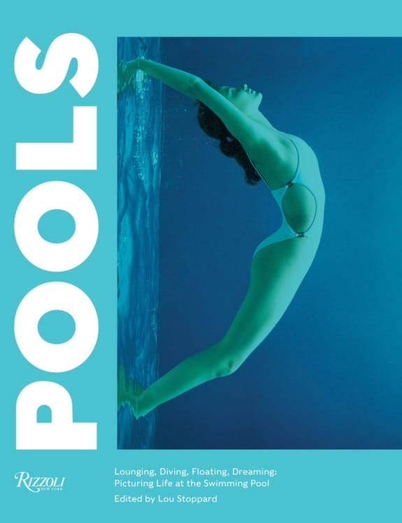Underwater woman in a swimsuit arching back against a turquoise background, cover of book "Pools" by Rizzoli.