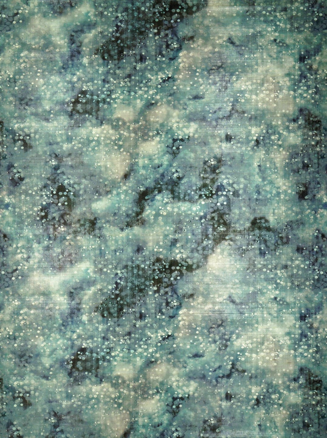 Abstract watercolor pattern with shades of blue and green, resembling a cloudy sky or ocean, with a textured effect
