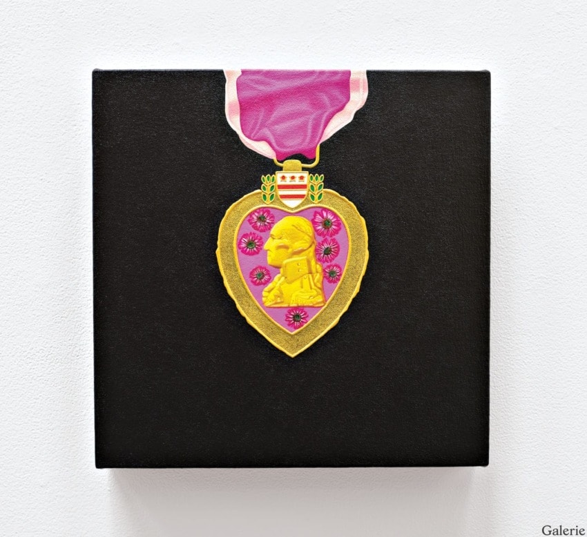 Artwork: gold medal with pink background and ribbon on black canvas, featuring a side profile and floral design.