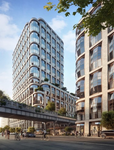 Modern cityscape with two contemporary glass buildings, street view with cyclists and pedestrians under a bridge, trees visible.