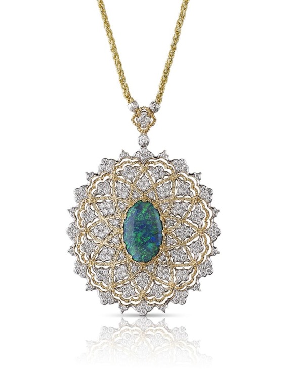 Elegant gold necklace with intricate diamond design and central blue-green opal pendant displayed on a reflective surface.
