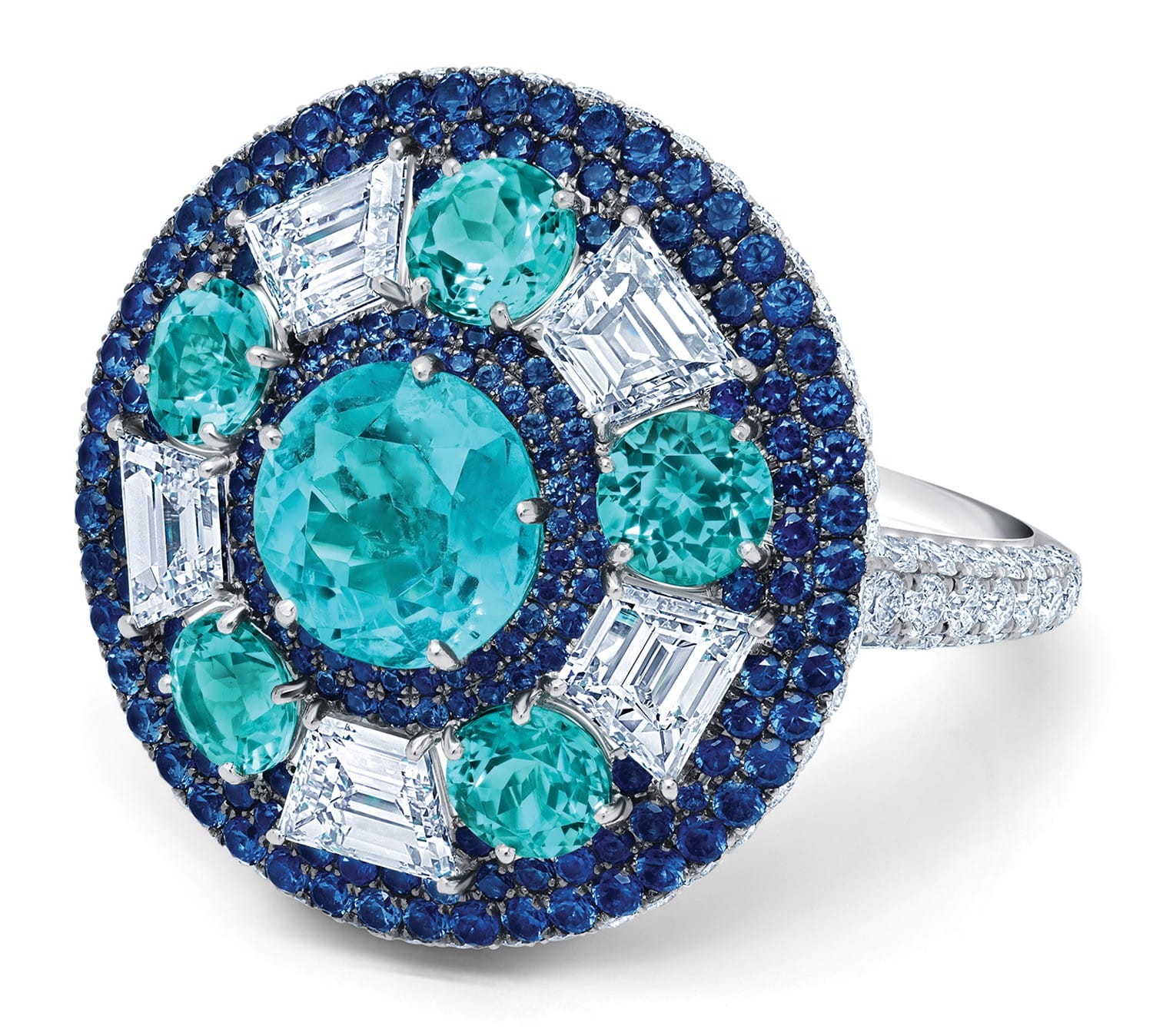 Turquoise and blue sapphire ring with diamond accents, featuring intricate circular design and sparkling gemstones.