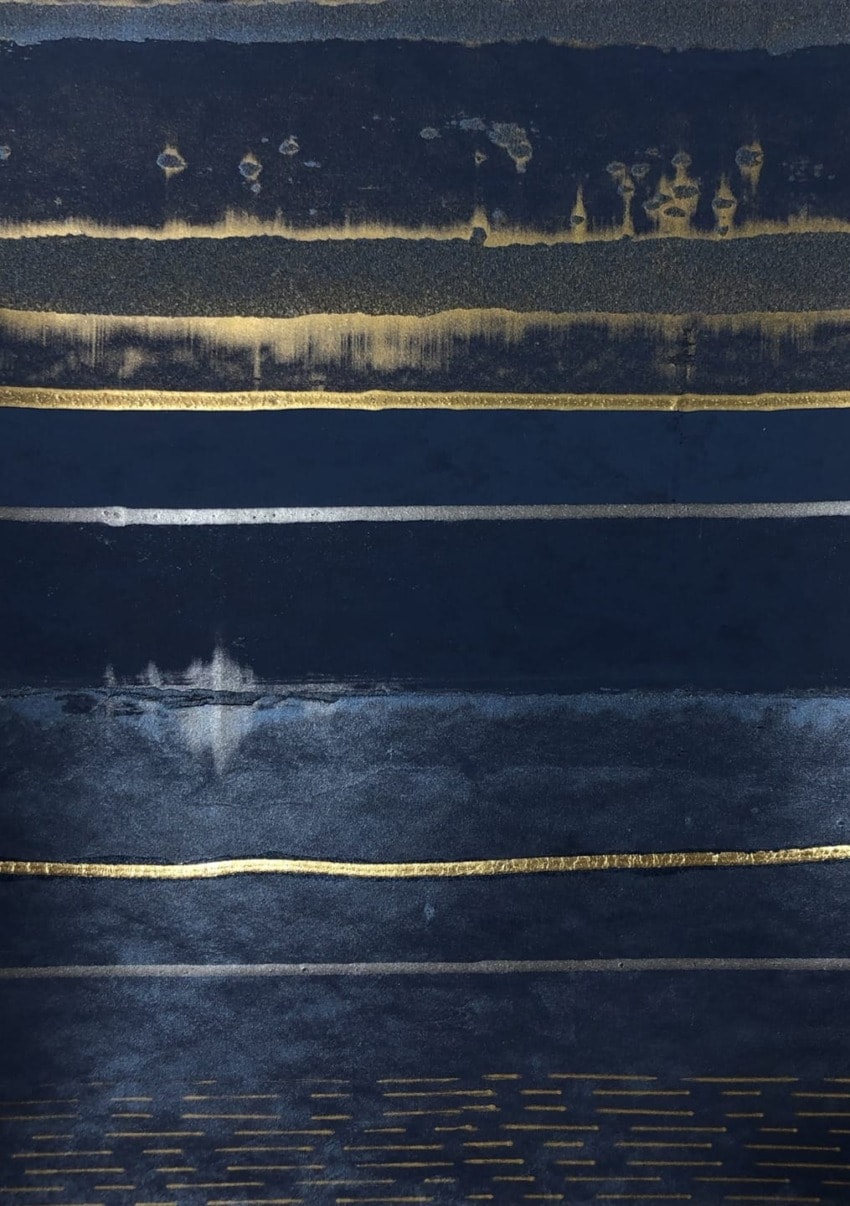Abstract artwork with horizontal gold and gray-blue lines and textures.