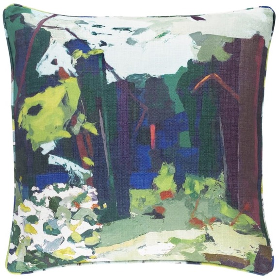 Abstract landscape-themed decorative pillow with vibrant green, blue, and white colors.