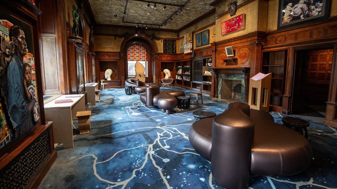 Installation view of "The Underground Library” by the Black Artists + Designers Guild in "Making Home—Smithsonian Design Triennial" at Cooper Hewitt, Smithsonian Design Museum.