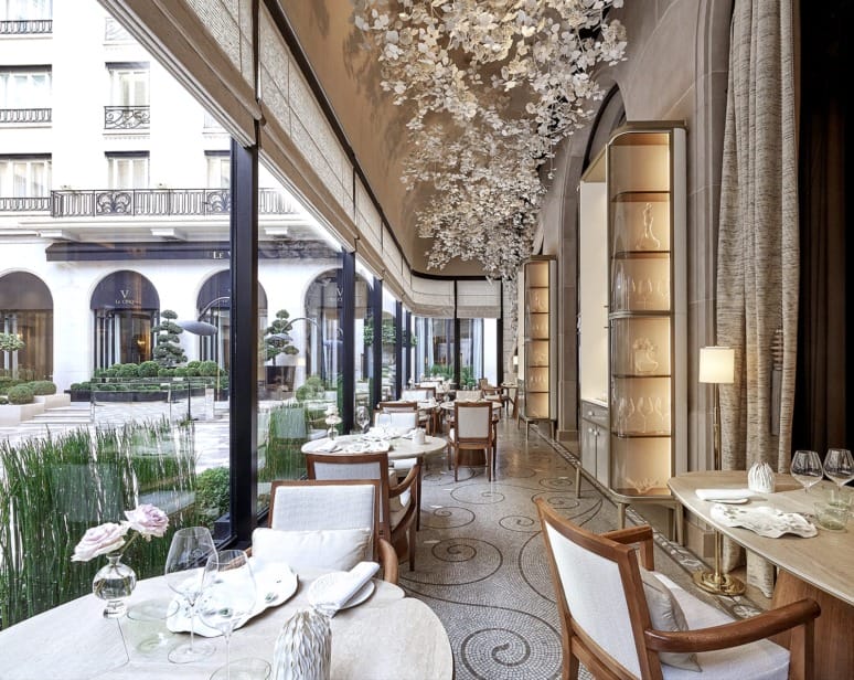 Interior of L'Orangerie Restaurant at Four Seasons George V designed by Pierre-Yves Rouchon.