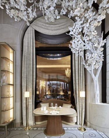 Interior of L'Orangerie Restaurant at Four Seasons George V designed by Pierre-Yves Rouchon.