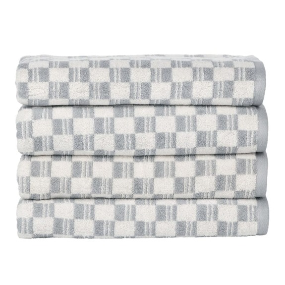 Stack of four folded checkered towels in gray and white pattern, neatly arranged against a plain background.