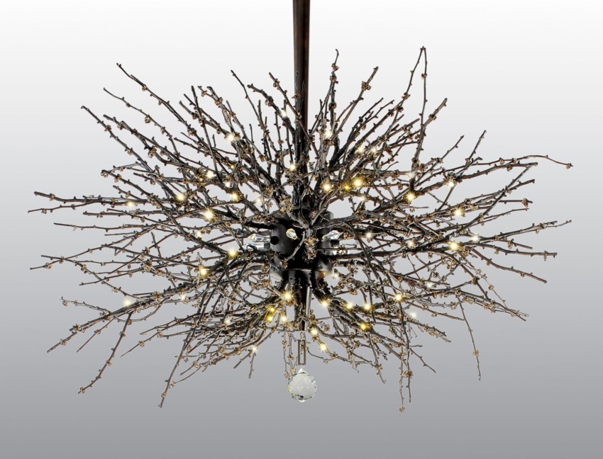 Modern chandelier with intricate branch-like design and glowing lights on a neutral background.
