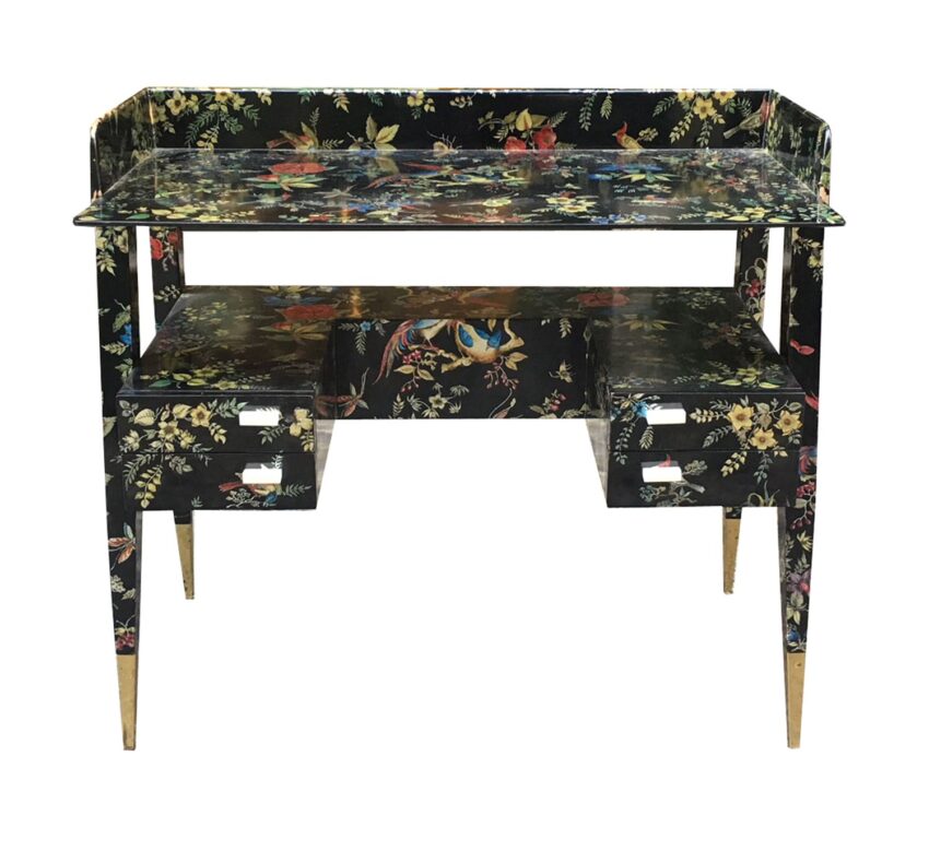 Vintage floral writing desk with multiple drawers and a high back shelf, decorated with colorful painted motifs.