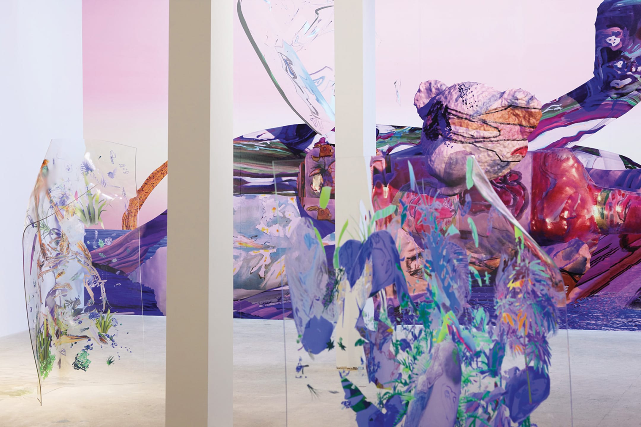 Colorful abstract art installation with painted panels and sculptural elements in a modern gallery setting