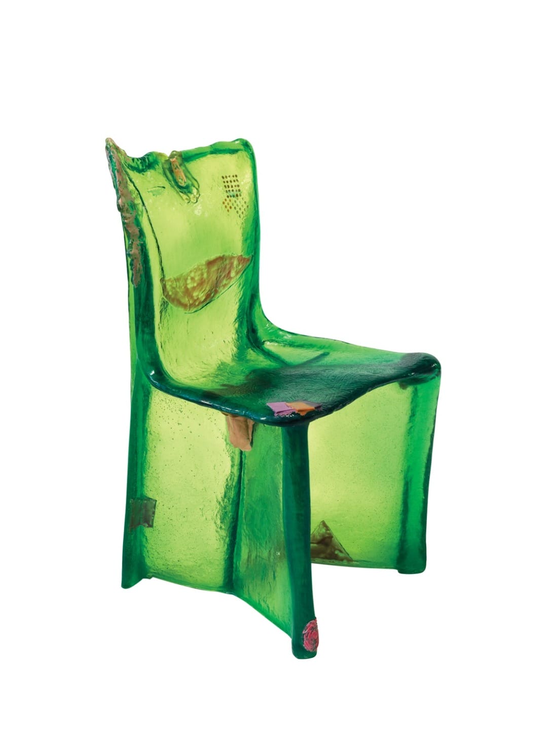 Green translucent chair with an abstract, artistic design and embedded leaf-like shapes.