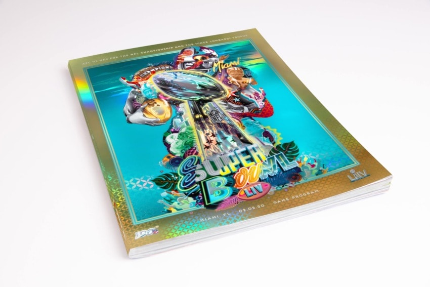 Super Bowl LIV program with vibrant Miami-themed design and large Vince Lombardi Trophy on cover.