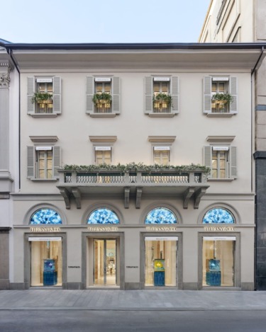 The windows feature Venini glass lunettes with a Gio Ponti design.