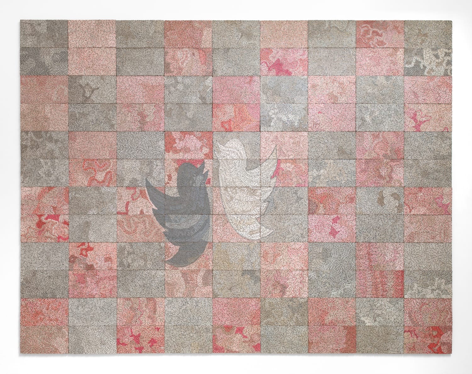 Patchwork art piece with intricate patterns and abstract bird shapes in shades of red, gray, and beige on a grid backdrop.