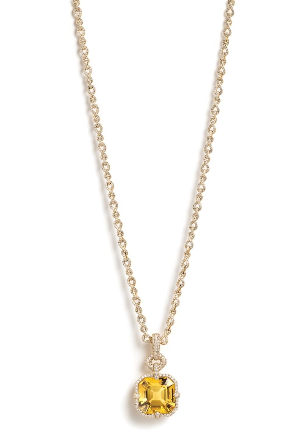 Gold chain necklace with a yellow gemstone pendant and small diamonds.