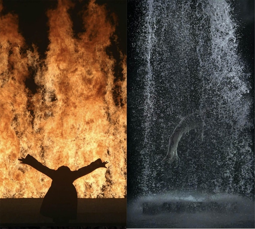 Silhouette person raising arms in front of wall of fire beside a figure enclosed by falling water droplets.