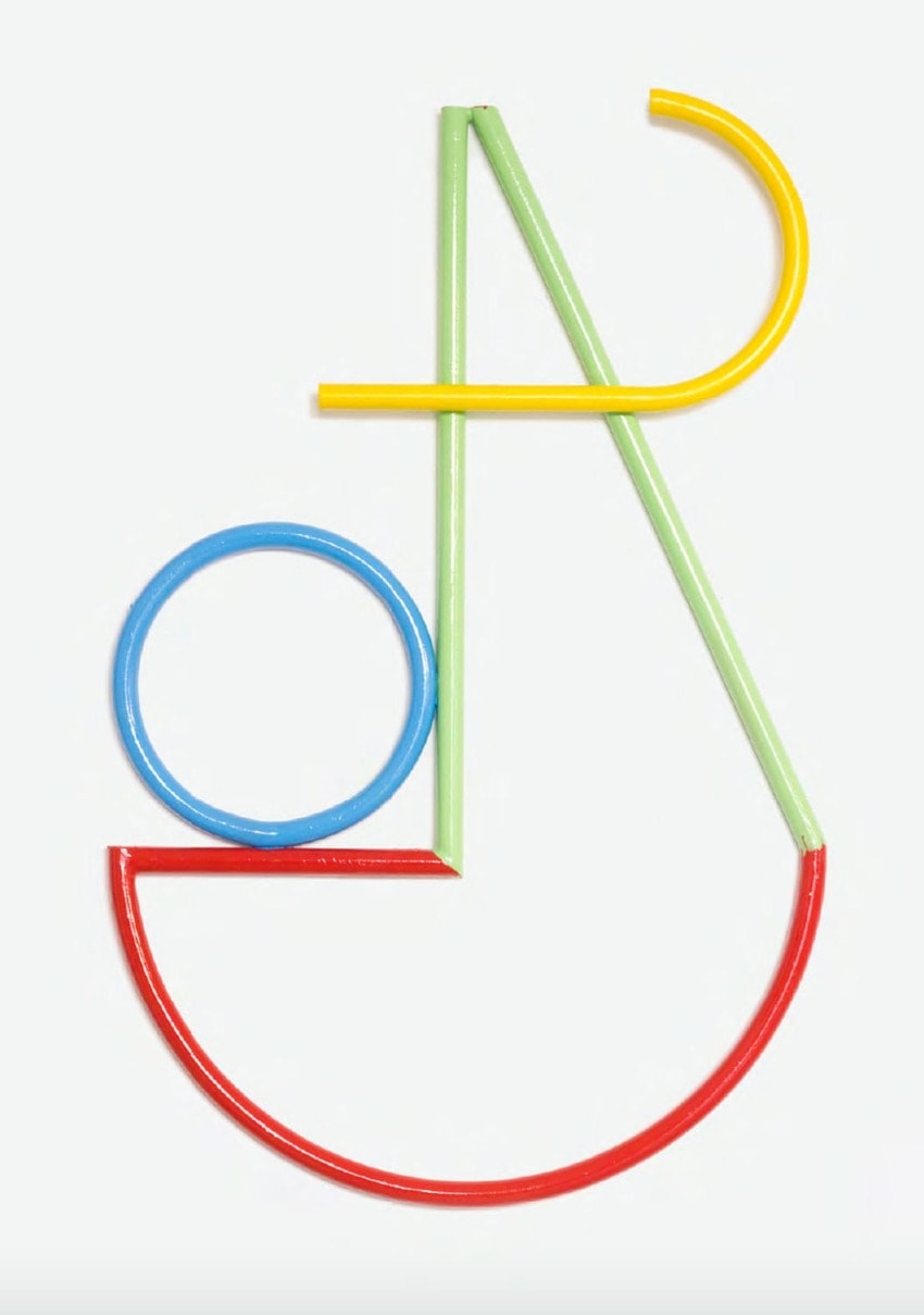 Colorful geometric shapes forming a modern abstract design against a white background.