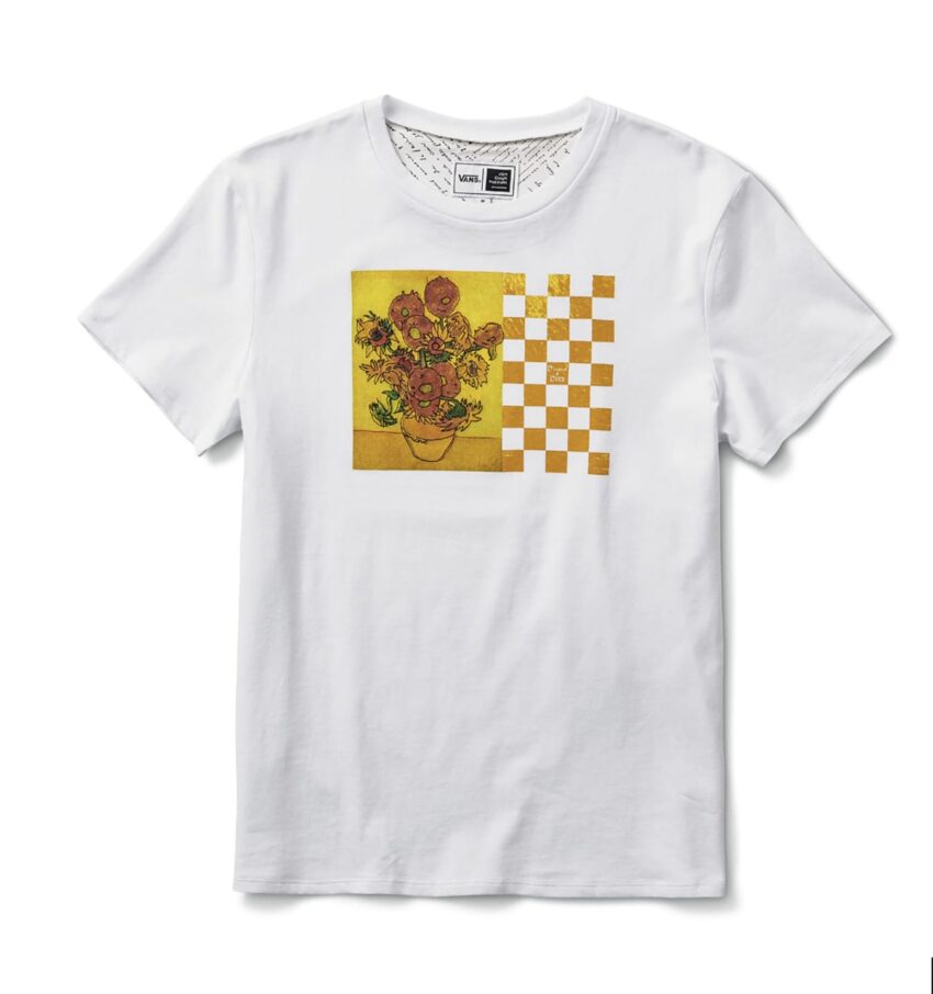 White t-shirt with a floral and checkered design on the front panel.