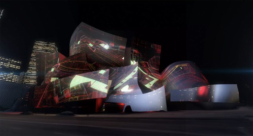 Futuristic, illuminated architectural structure with curving metallic surfaces and colorful abstract projections at night.