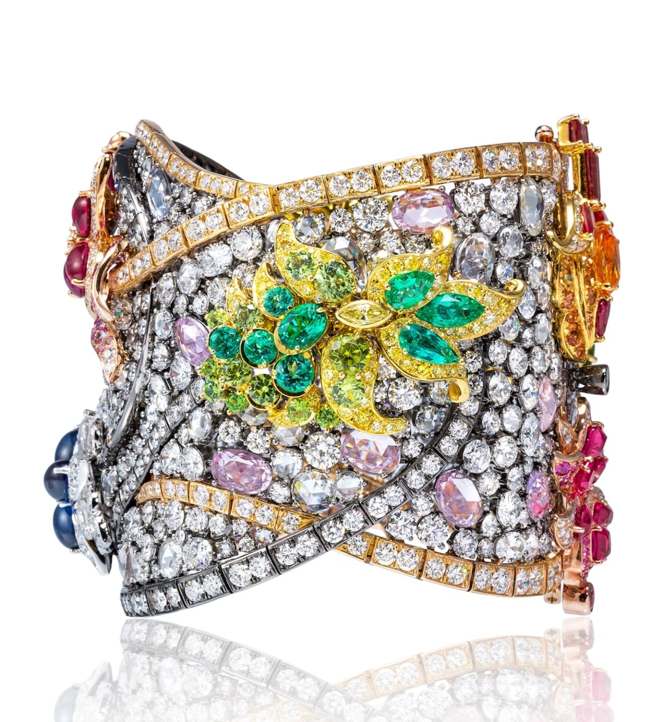 Exquisite multicolored gemstone bracelet with intricate floral design and sparkling diamond accents on reflective surface.
