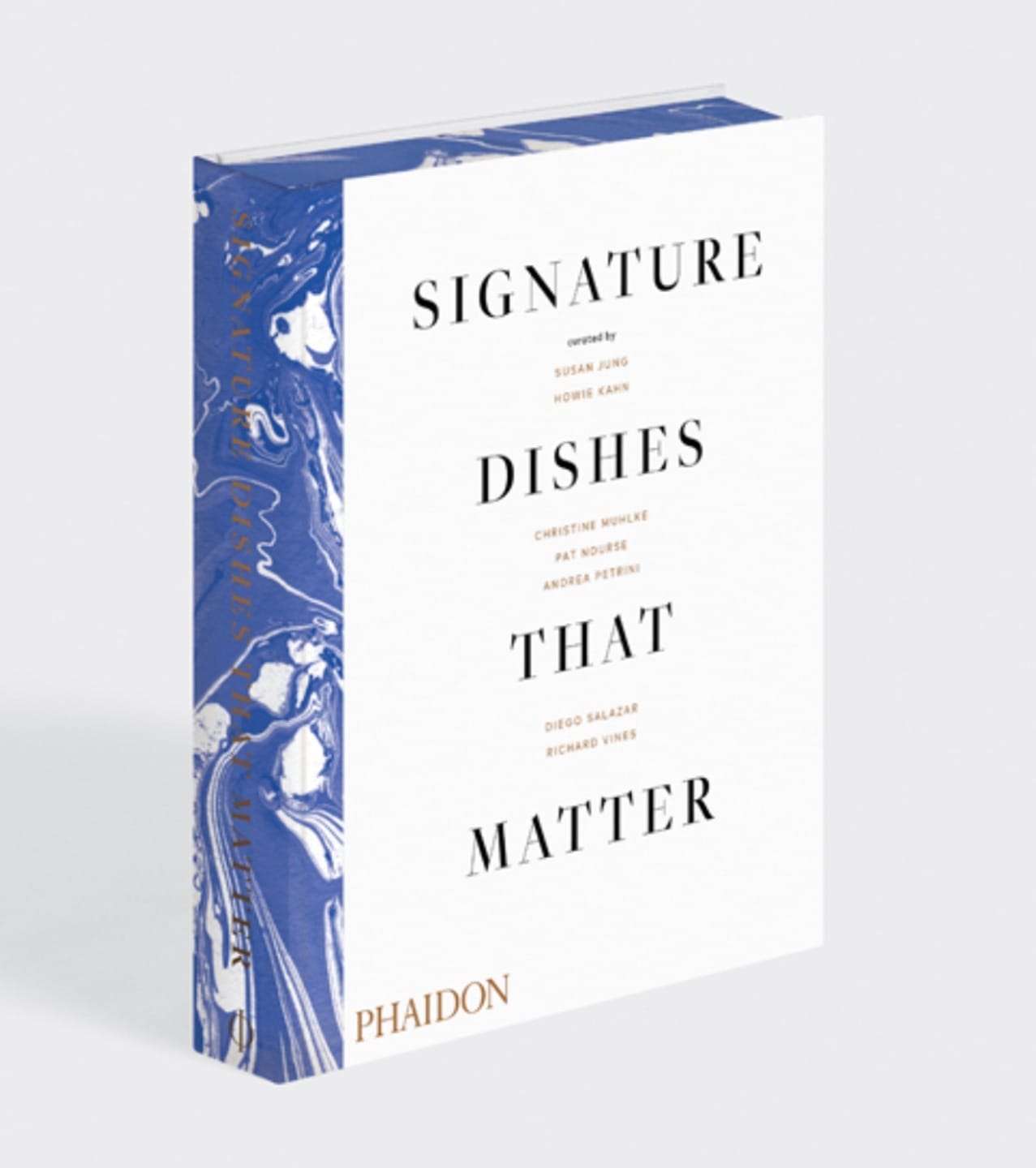 Cookbook titled "Signature Dishes That Matter" with a blue and white marbled cover, published by Phaidon.